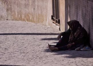 homeless woman on the street