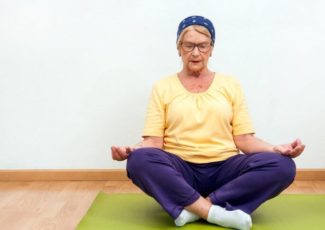 older adult meditating